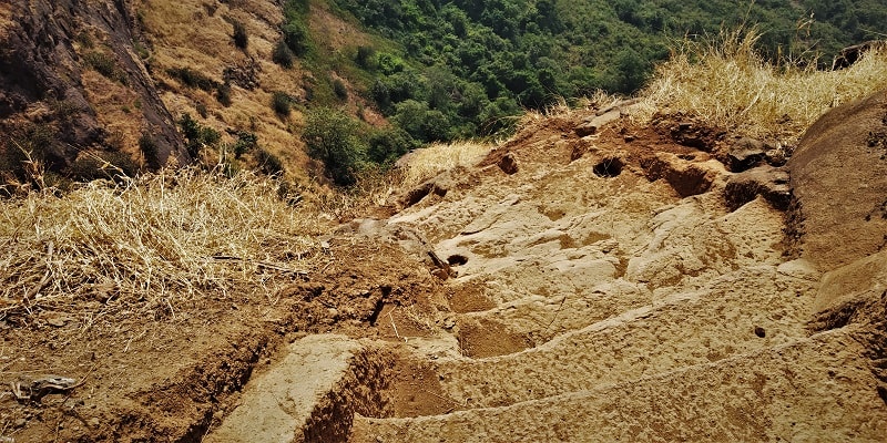 Rock cut stairs as seen on Kalavantin Durg Trek